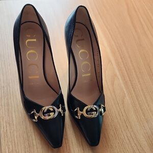 Gucci Elegant Black Heels with Gold/Silver Logo